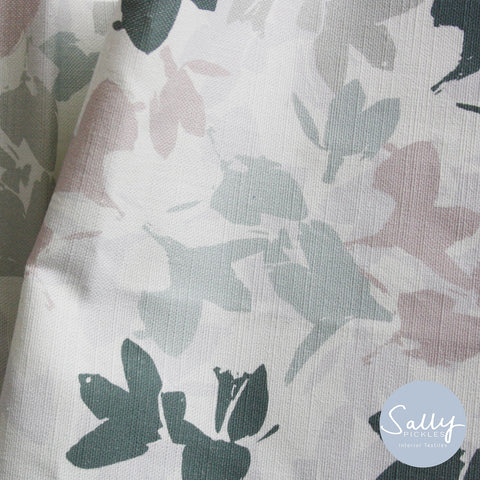 Abstract floral fabric pattern in grey and pink